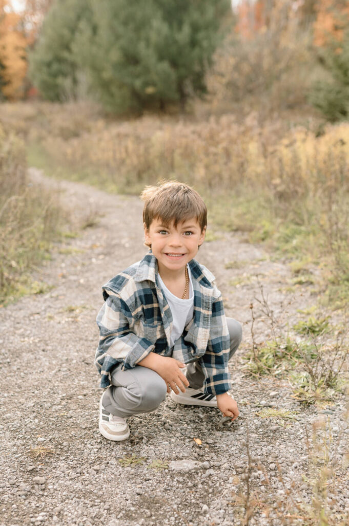 Fall family photography session in Bolton Ontario with colourful autumn leaves