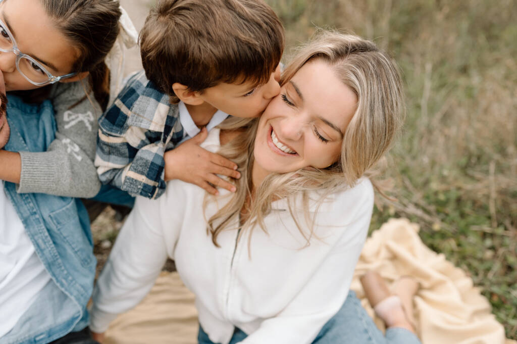 Fall family photography session in Bolton Ontario with colourful autumn leaves