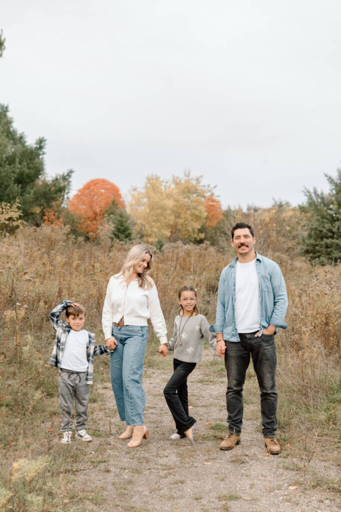 Fall family photography session in Bolton Ontario with colourful autumn leaves
