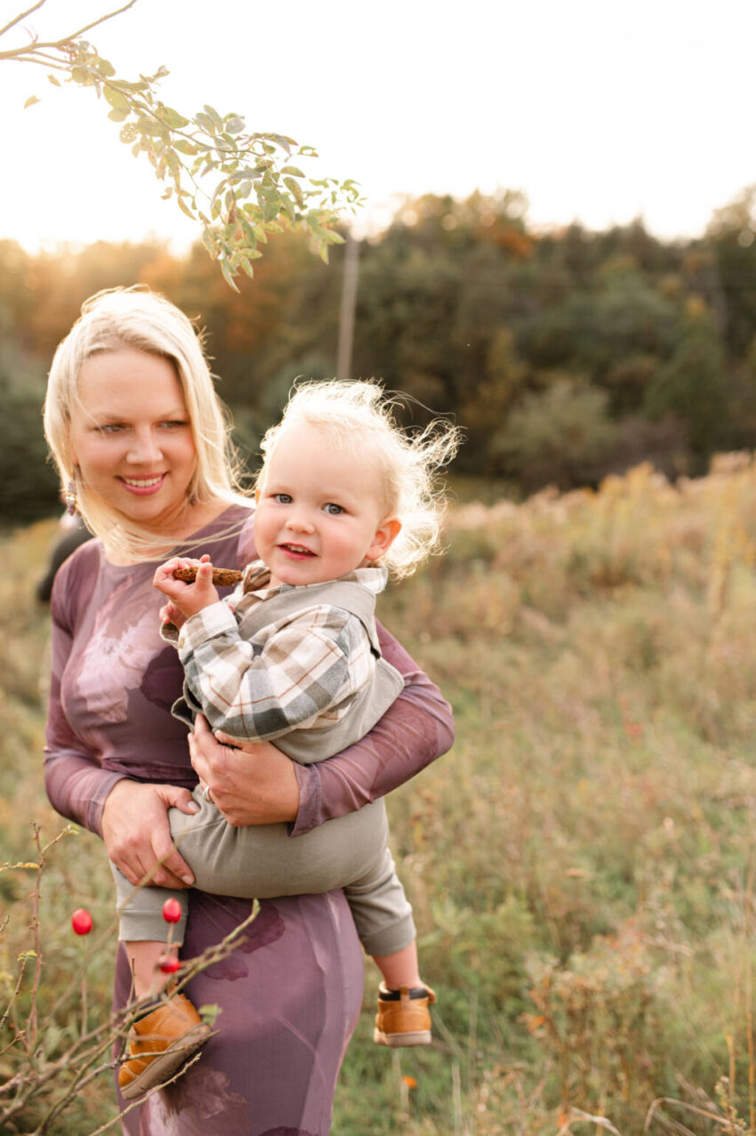 Fall family photography session in Bolton Ontario with colourful autumn leaves