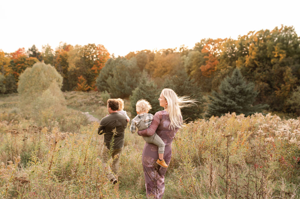 Fall family photography session in Bolton Ontario with colourful autumn leaves
